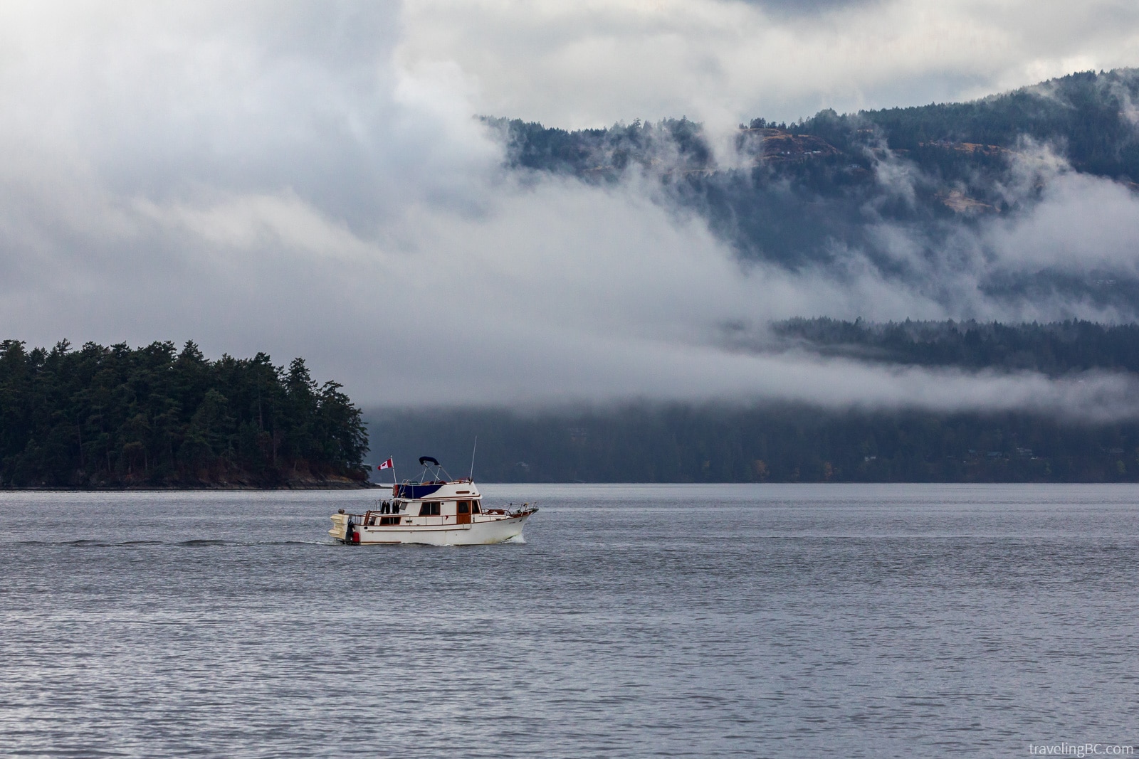 A boat cruising through the Gulf Islands