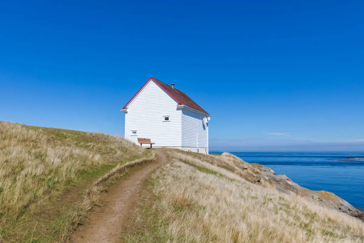 The old Fog Alarm Building that houses the Saturna Heritage Centre at East Point Park