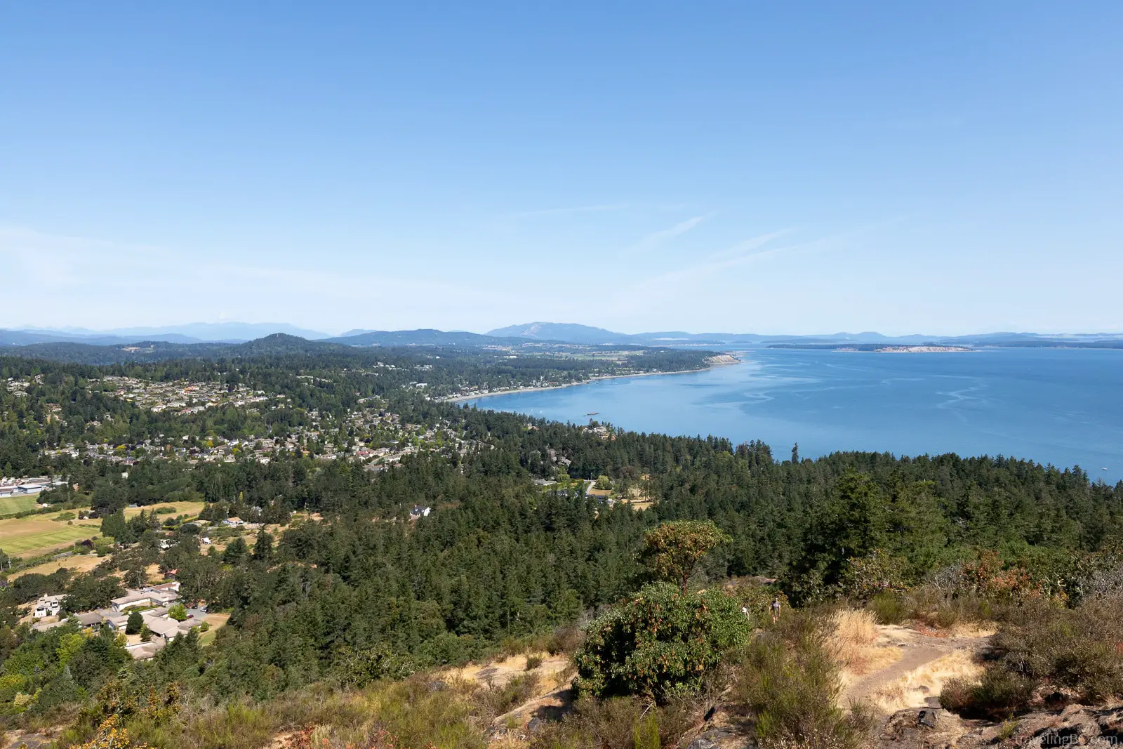 The spectacular view of Cordova Bay from the summit of PKOLS (Mount Douglas)