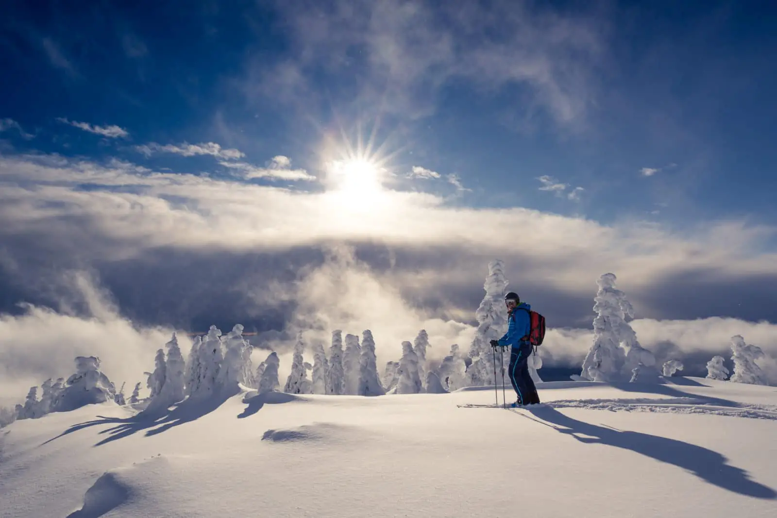 A skier in the mountains by Kelowna - Photo: Geoff Holman / Big White Ski Resort