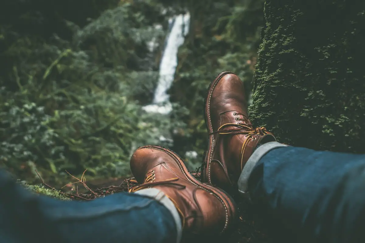 A picture of someone's hiking boots while they sit in Cypress Falls Park in Vancouver