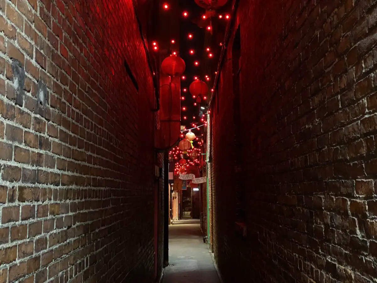 The glowing red lanterns in Fan Tan Alley, one of the hidden gems in Chinatown in Victoria, BC