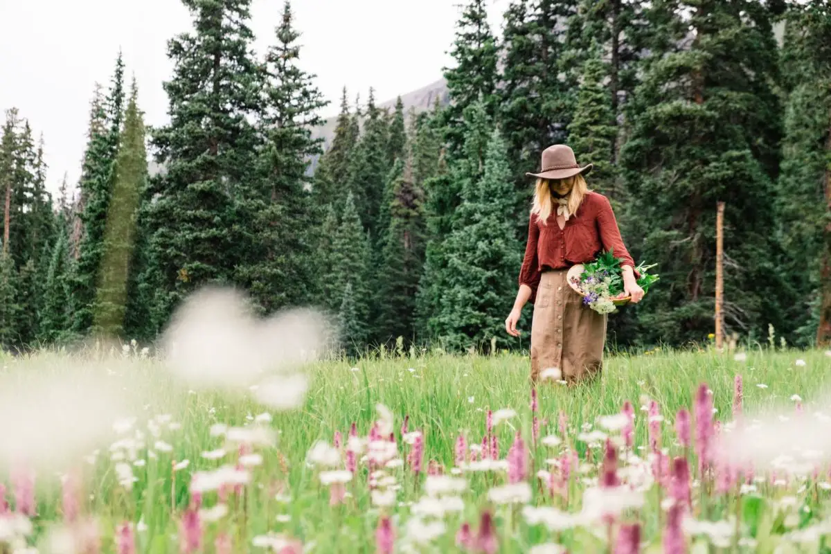 A lady foraging in a field