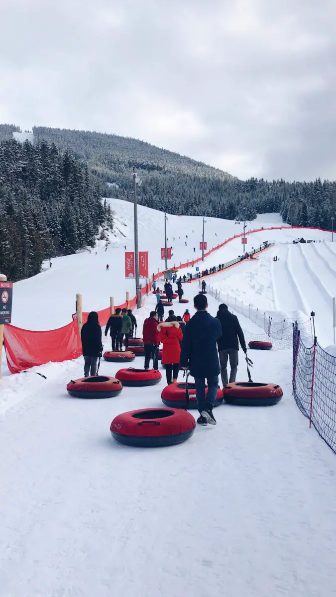 People snow tubing at Whistler BC's tube park