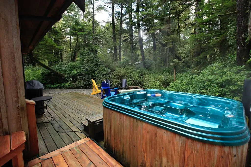 The hot tub surrounded by rainforest at the West Coast Hideaway in Tofino, BC
